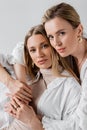 portrait of stylish loving sisters in Royalty Free Stock Photo