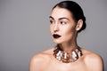 portrait of stylish nude girl posing wit black lips and trendy necklace Royalty Free Stock Photo