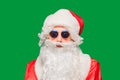 Portrait of stylish Santa Claus on color background Royalty Free Stock Photo