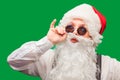 Portrait of stylish Santa Claus on color background Royalty Free Stock Photo