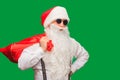 Portrait of stylish Santa Claus on color background Royalty Free Stock Photo