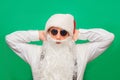 Portrait of stylish Santa Claus on color background Royalty Free Stock Photo