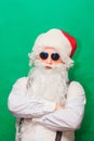 Portrait of stylish Santa Claus on color background Royalty Free Stock Photo