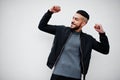 Portrait of stylish satisfied arab beard man wear grey turtleneck and black jaket. Arabian model guy