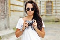 Portrait of stylish young brunette woman in casual clothes with Royalty Free Stock Photo