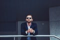 Portrait of stylish young man in sunglasses Royalty Free Stock Photo