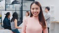 Portrait of successful beautiful executive businesswoman smart casual wear looking at camera and smiling, happy in modern office Royalty Free Stock Photo