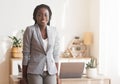 Portrait Of Successful Black Businesswoman Standing Near Her Desk In Office