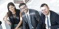 Portrait of successful business team sitting in office lobby Royalty Free Stock Photo