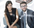 Portrait of successful business team sitting in office lobby Royalty Free Stock Photo