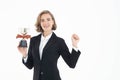 Portrait of successful business woman hoding trophy