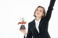 Portrait of successful business woman hoding trophy