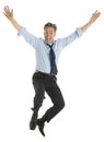 Portrait Of Successful Businessman Jumping In Joy