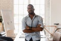 Portrait of successful confident african businessman posing in modern office Royalty Free Stock Photo