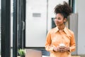 Portrait of successful and confident black businesswoman. A beautiful young African American woman, smiling at the Royalty Free Stock Photo