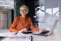 Portrait of successful financier woman, businesswoman behind paper accounting work smiling and looking at camera, female Royalty Free Stock Photo