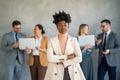 Portrait of successful group of business people at office. Multiethnic group of people smiling. Royalty Free Stock Photo