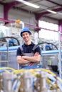 portrait of successful workman in an industrial company, in working clothes at the workplace Royalty Free Stock Photo