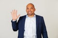 Portrait of successful young African American businessman guy, showing with fingers number five, smiling, confident and happy. The Royalty Free Stock Photo