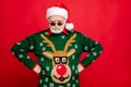 Portrait sullen frown grumpy grey hair old man in black spectacles santa claus headwear scold naughty kids on x-mas