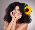 Portrait, sunflower and black woman with skincare, cosmetics and dermatology on grey studio background. Face detox Royalty Free Stock Photo