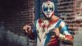 Portrait of a super hero in red and blue Lucha Libre wrestling mask costume posing against brick wall. Generative AI