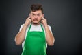 Portrait of supermarket employer gesturing deaf monkey