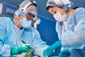 Portrait of a surgeon close-up. Surgeons operate on a patient. Tense, serious faces. Real operation. Tensioned