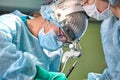 Portrait of a surgeon close-up. Surgeons operate on a patient. Tense, serious faces. Real operation. Tensioned