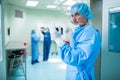 Portrait of surgeon looking at camera in operation room