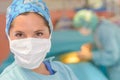 Portrait surgeon wearing surgical mask in operation room Royalty Free Stock Photo