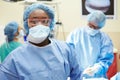 Portrait Of Surgeon Working In Operating Theatre