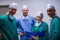 Portrait of surgeons team standing in corridor Royalty Free Stock Photo