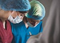 Portrait of surgeons at work, operating in uniform.