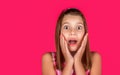 Portrait of surprised little toddler girl child isolated pink background. Wow. Emotional little girl, being surprised Royalty Free Stock Photo