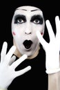 Portrait of the surprised mime in white gloves Royalty Free Stock Photo