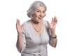 Portrait of surprised senior woman posing on white background Royalty Free Stock Photo