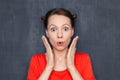 Portrait of surprised woman with funny hairstyle Royalty Free Stock Photo