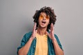 Shouting stylish casual student in eyeglasses Royalty Free Stock Photo