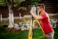 Portrait of surveyor engineer using professional total station