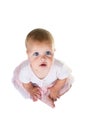 Portrait of a sweet infant wearing a pink tutu, necklace, and headband bow, isolated on white background Royalty Free Stock Photo