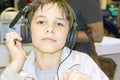 Portrait of a sweet young boy listening to music Royalty Free Stock Photo