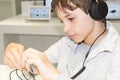 Portrait of a sweet young boy listening to music on headphones Royalty Free Stock Photo