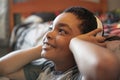 A Portrait of a sweet young boy listening to music on headphones Royalty Free Stock Photo