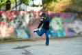 Portrait of talented male dancer showing a hip hop performance on the street