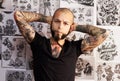 Portrait, tattoo and man with creativity, artist and business with skills, wallpaper and design. Face, male person and