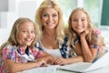 Teacher with two schoolgirls Royalty Free Stock Photo