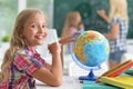 Teacher with two schoolgirls Royalty Free Stock Photo