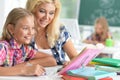 Teacher with two schoolgirls Royalty Free Stock Photo