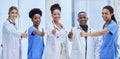 Portrait, team of doctors and thumbs up for teamwork, support and hospital services mission. Medical nurses, people or Royalty Free Stock Photo